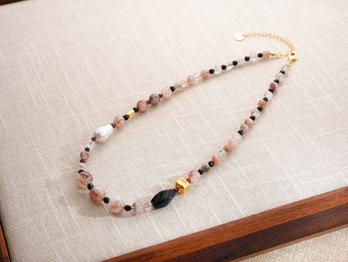 Full view natural crystal and baroque pearl necklace with black and gold accents, SKU 260854