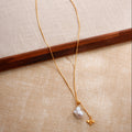 Miel baroque pearl and bee lariat necklace full view